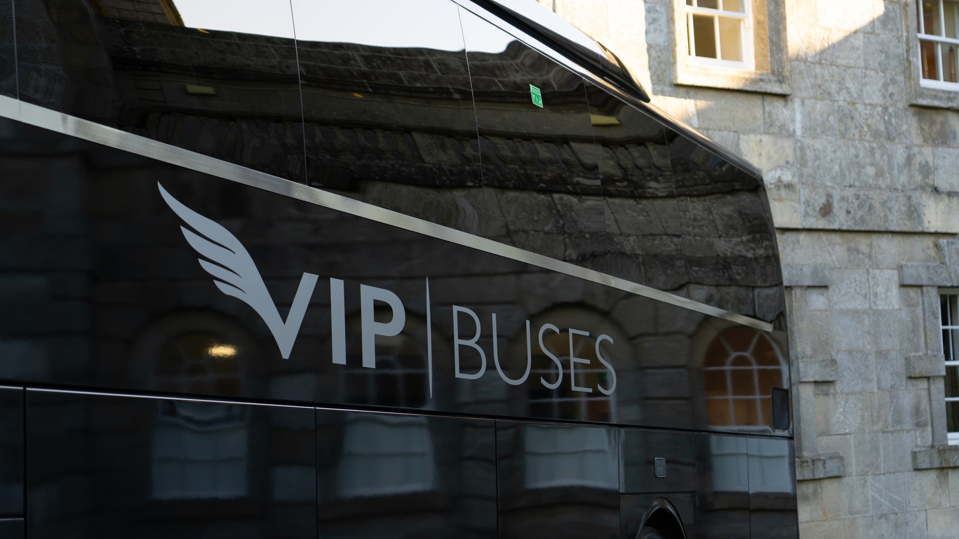 VIP Buses Mercedes Turismo 41 Seater Coach close up of the branding along the side panel