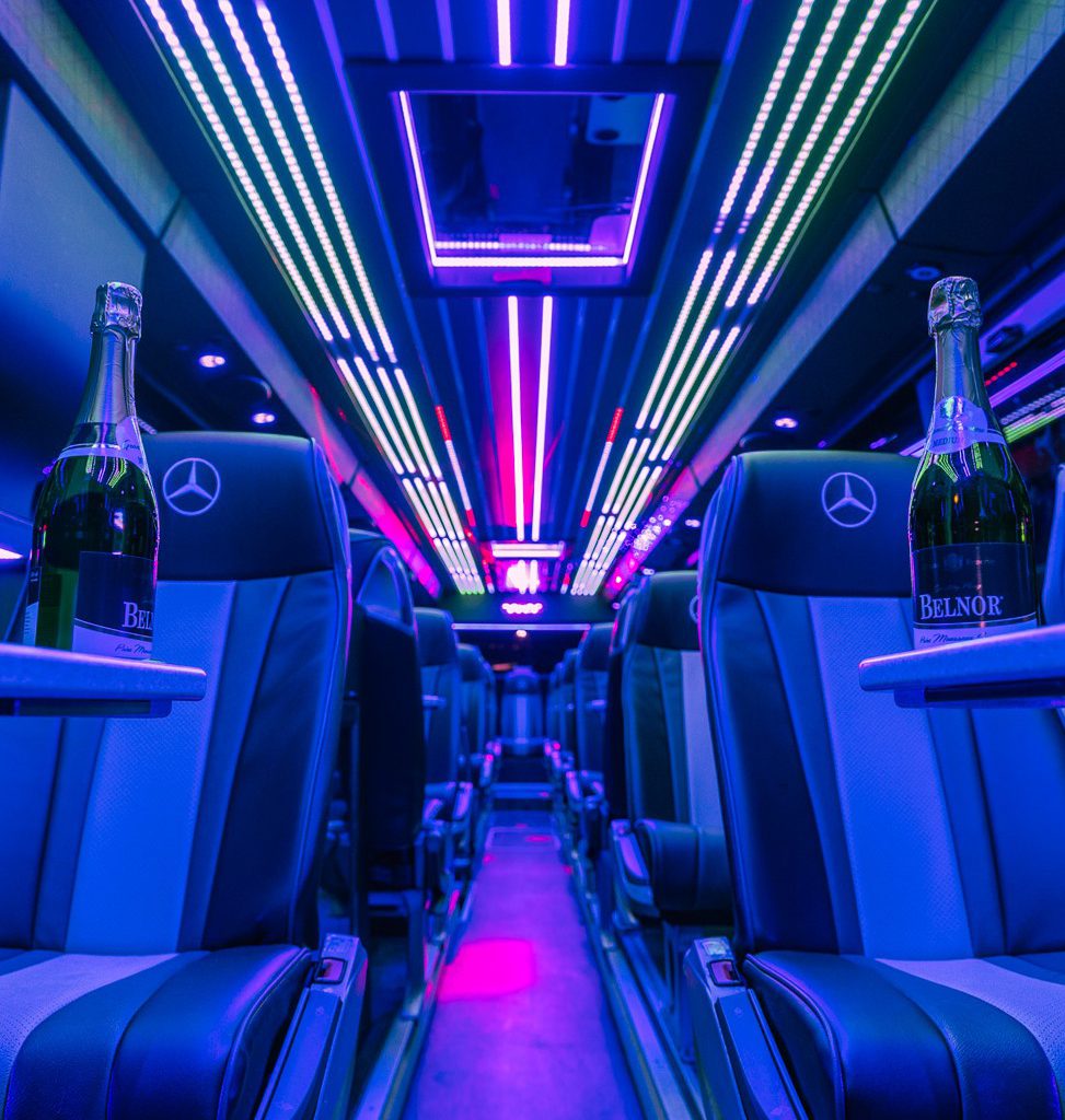 VIP Buses Mercedes Turismo 41 Seater Coach interior at night with champagne on the tables
