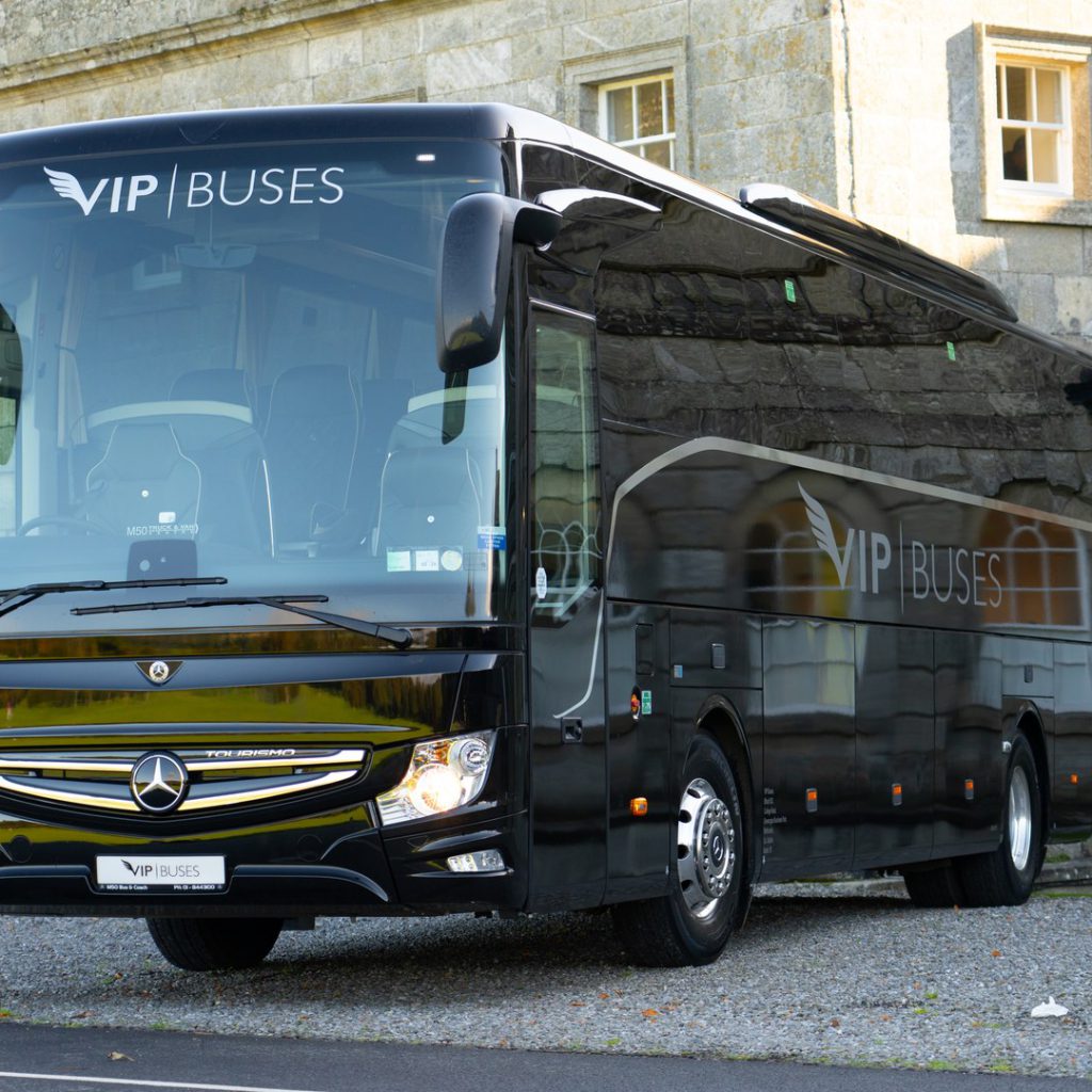 VIP Buses Mercedes Turismo 41 Seater Coach front three quarter on the gravel with the house behind