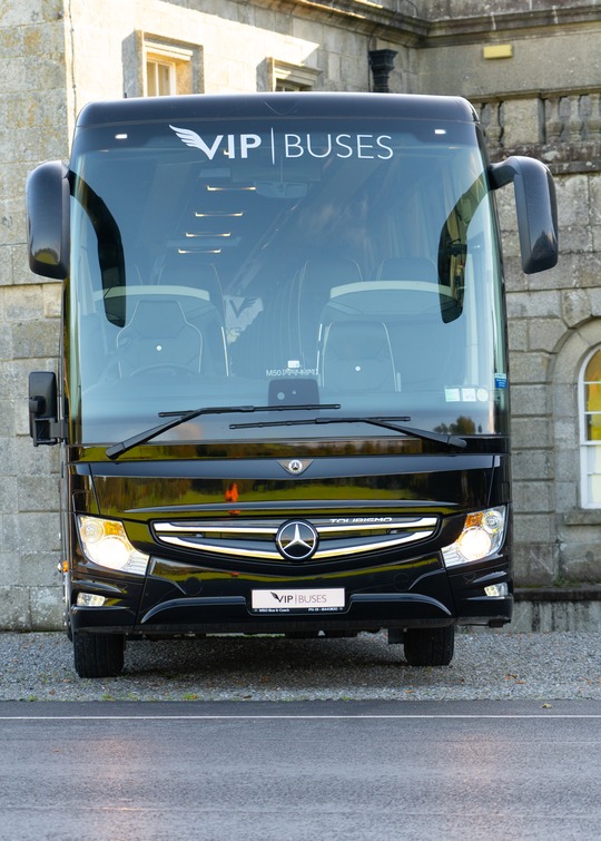 VIP Buses Mercedes Turismo 41 Seater Coach head on centred in front of the house entrance