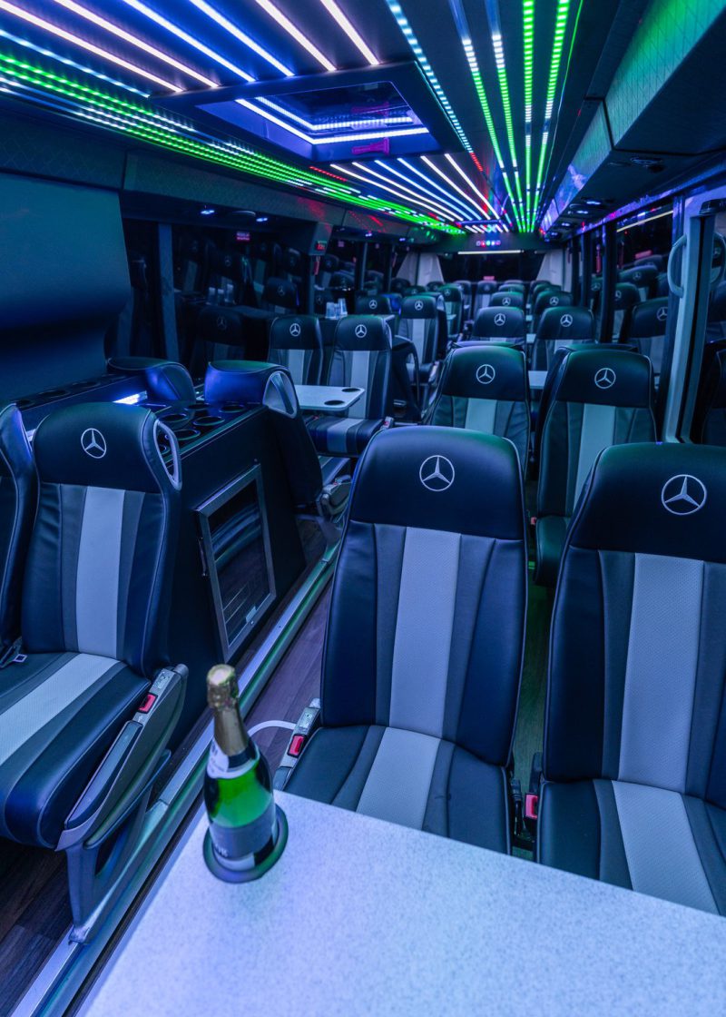 VIP Buses Mercedes Turismo 41 Seater Coach interior at night with a bottle under green LEDs