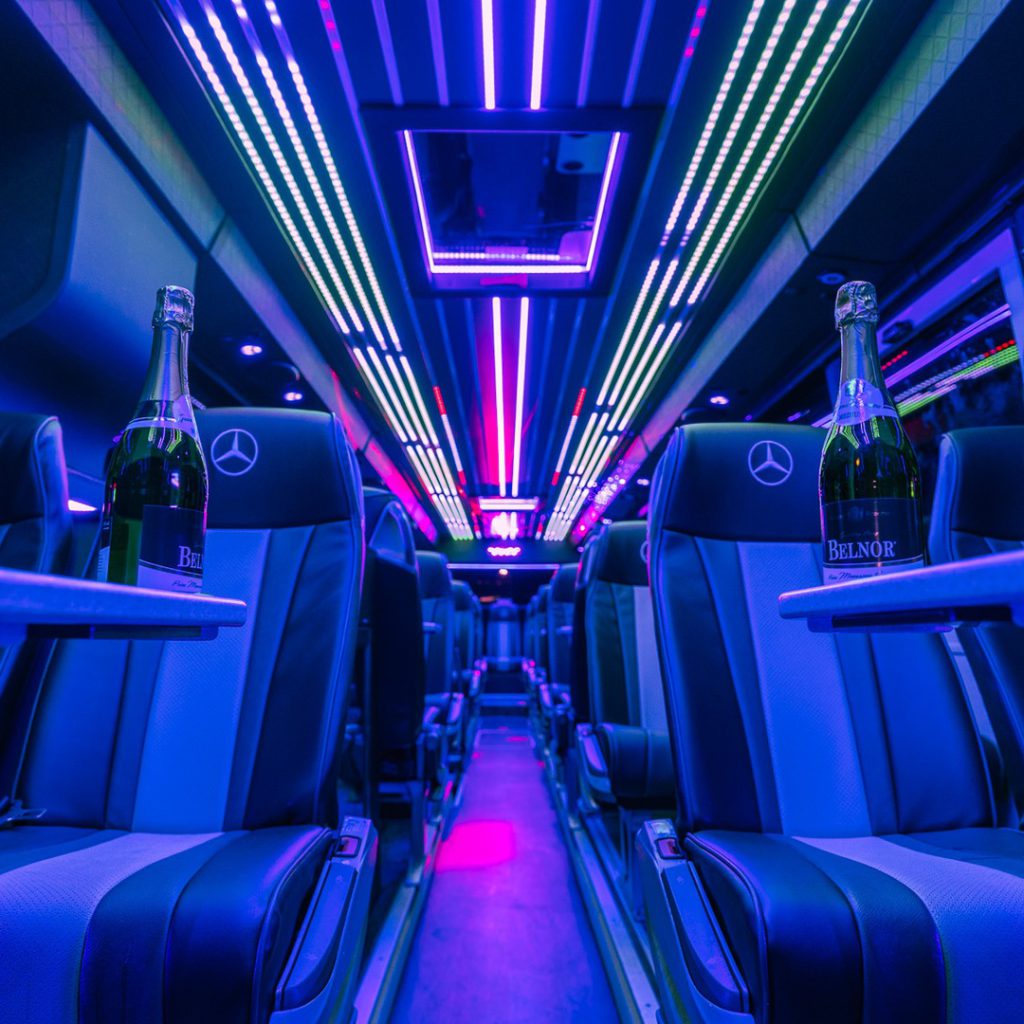 VIP Buses Mercedes Turismo 41 Seater Coach interior at night with champagne on the tables