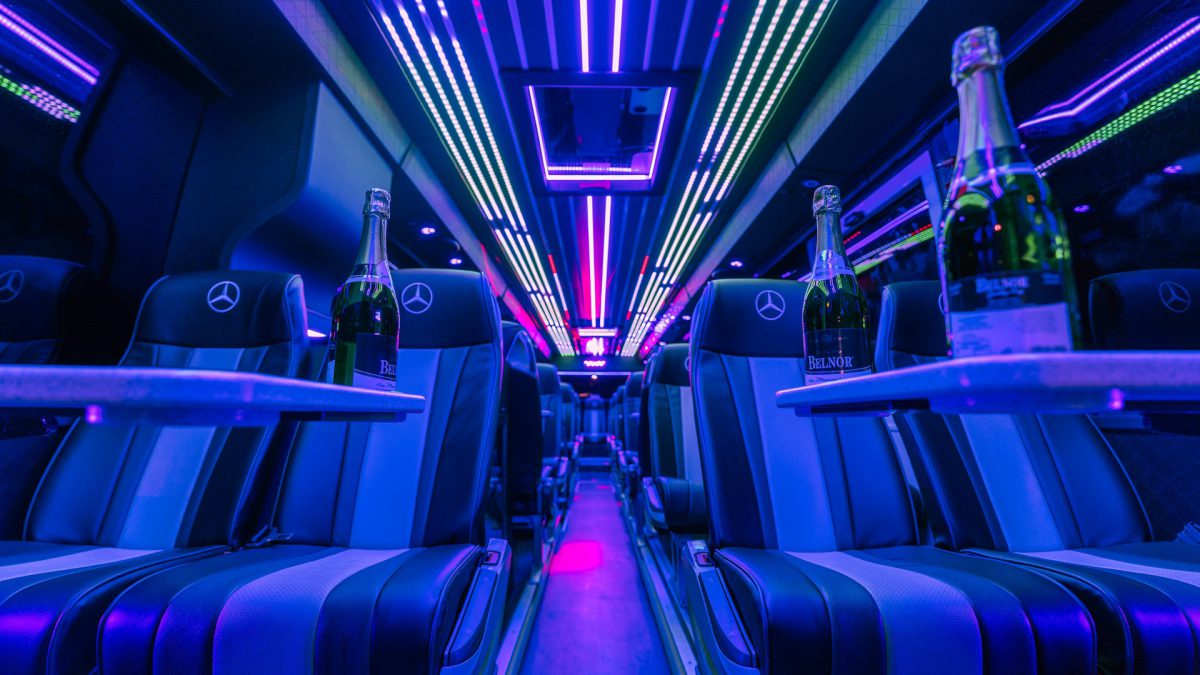 VIP Buses Mercedes Turismo 41 Seater Coach interior at night with champagne on the tables