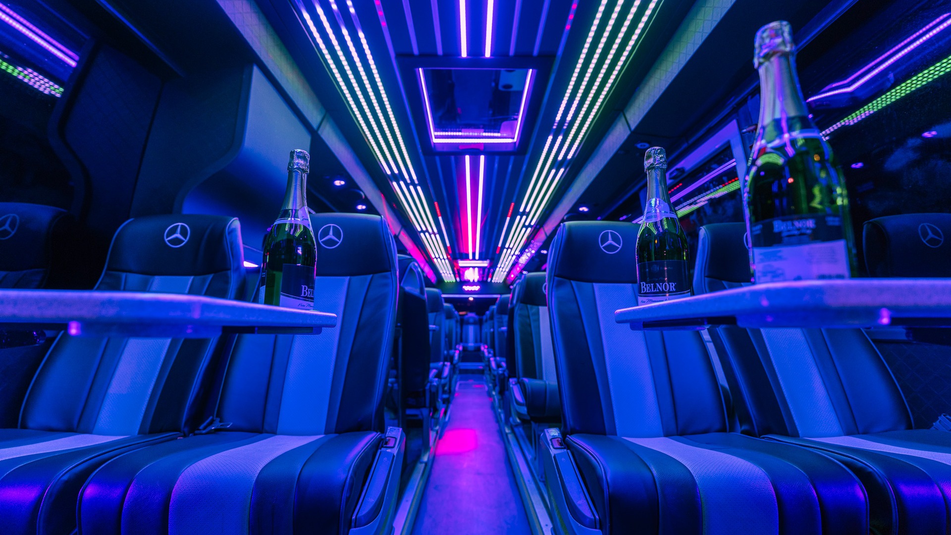 VIP Buses Mercedes Turismo 41 Seater Coach interior at night with champagne on the tables