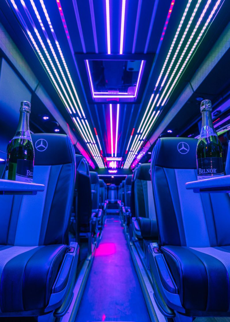 VIP Buses Mercedes Turismo 41 Seater Coach interior at night with champagne on the tables