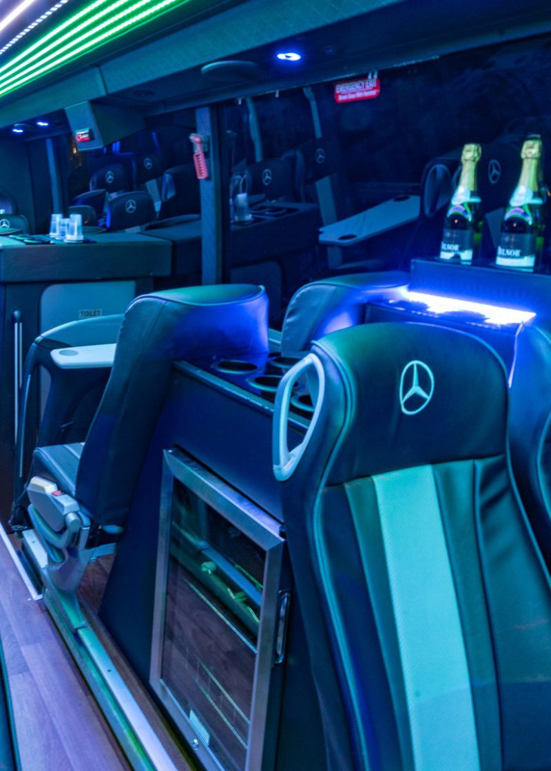 VIP Buses Mercedes Turismo 41 Seater Coach the drinks console and glasses under blue LEDs