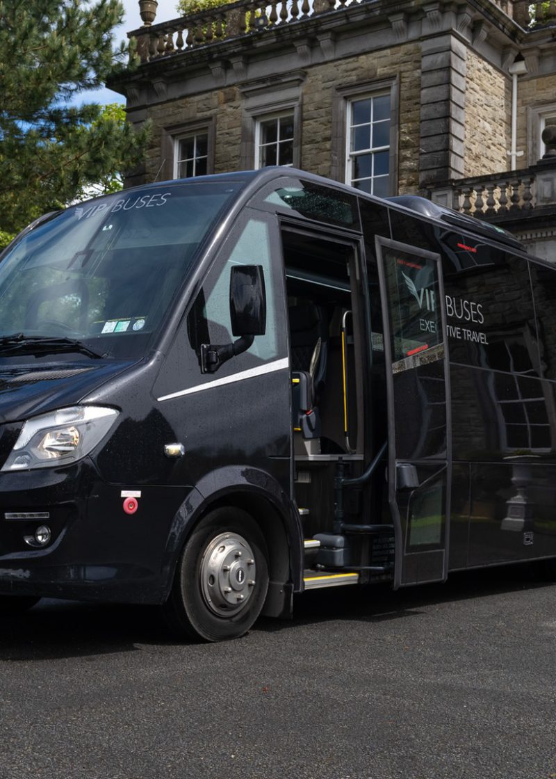 VIP Buses Turas 33 Seater Coach front three quarter with the passenger door open