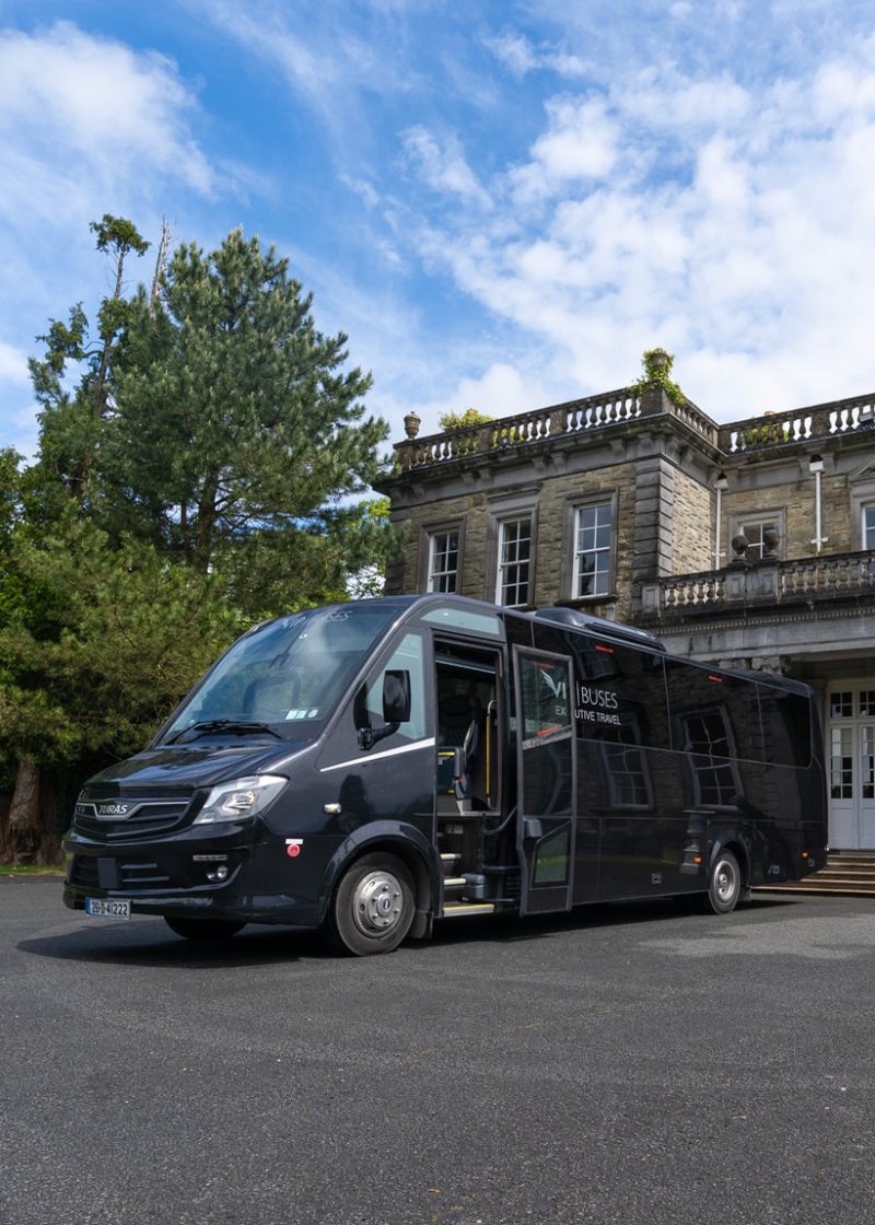 VIP Buses Turas 33 Seater Coach parked on the drive with the full house facade behind